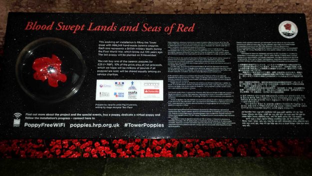 Plaque at the Tower of London mote explaining the art installation